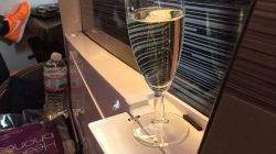 a glass of champagne on a window sill