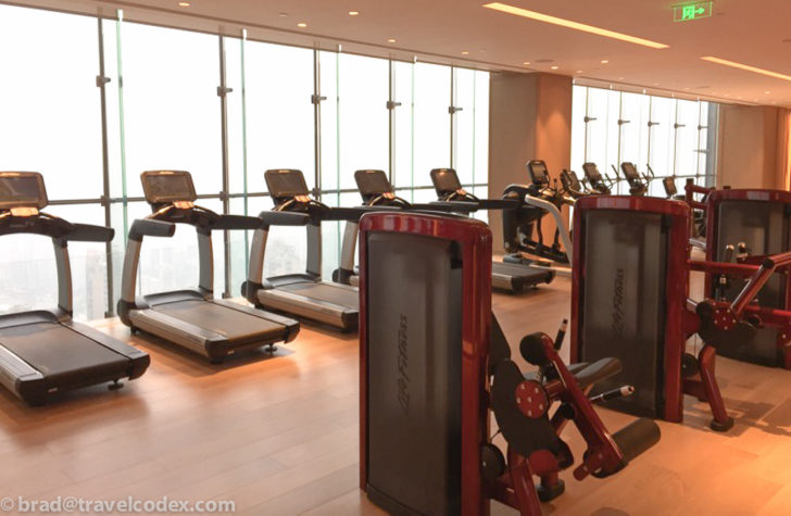 a room with treadmills and exercise machines