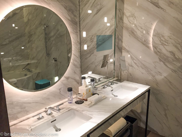 a bathroom with a mirror and sink