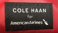 a black and white label on a red surface