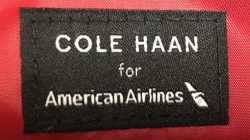 a black and white label on a red surface