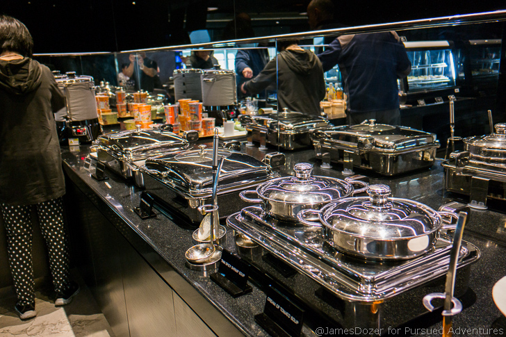 a group of silver containers on a counter