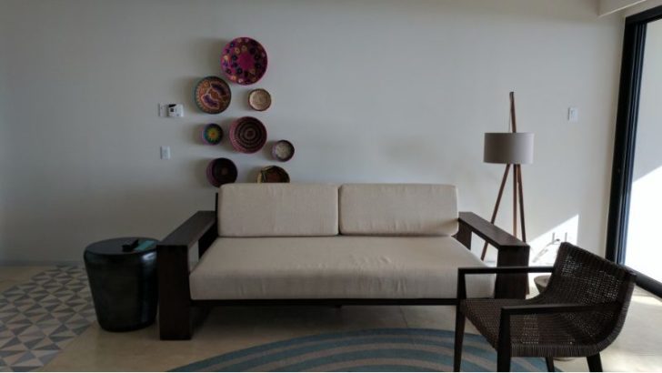 a couch and chairs in a room