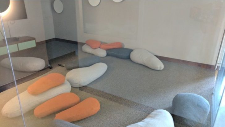 a group of pillows on the floor