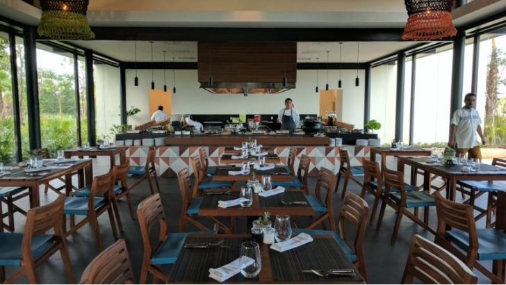 a restaurant with tables and chairs