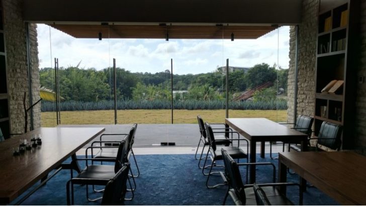 a room with tables and chairs