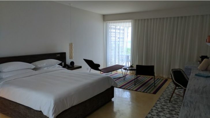 a room with a bed and a chair