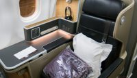 a seat with a pillow in it