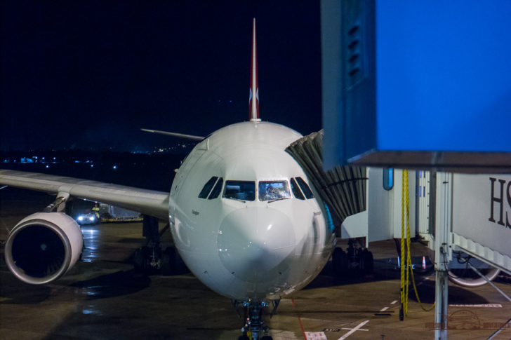 a white airplane at night
