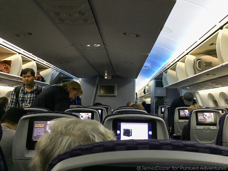 a group of people in an airplane