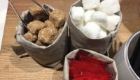 a group of bags of sugar and sugar
