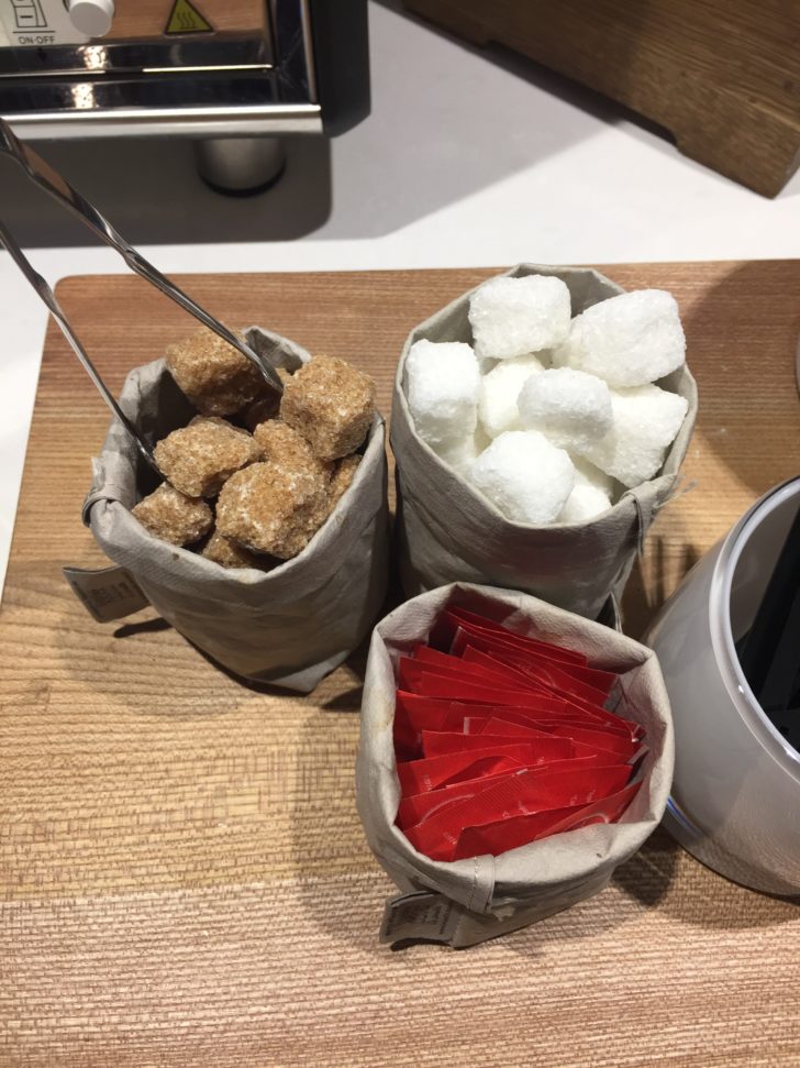 a group of bags of sugar and sugar