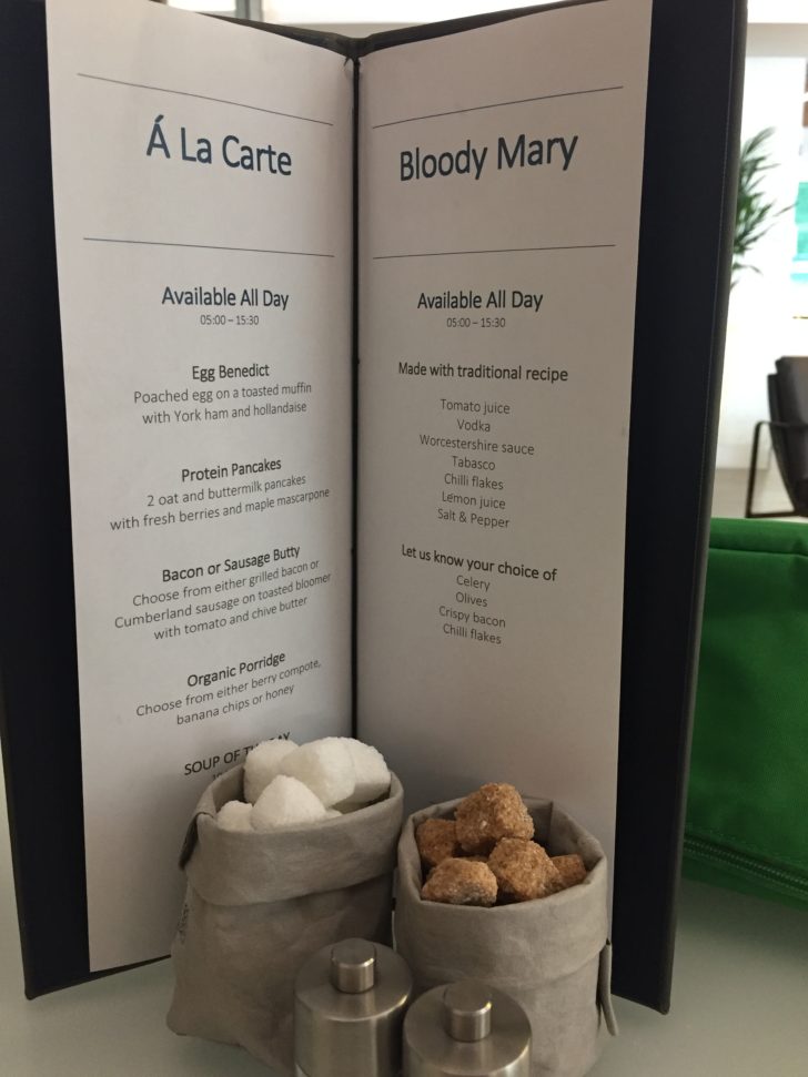a menu with a couple of bags of sugar and a bag of eggs