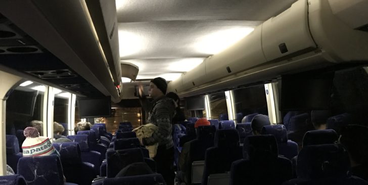 a group of people on a bus