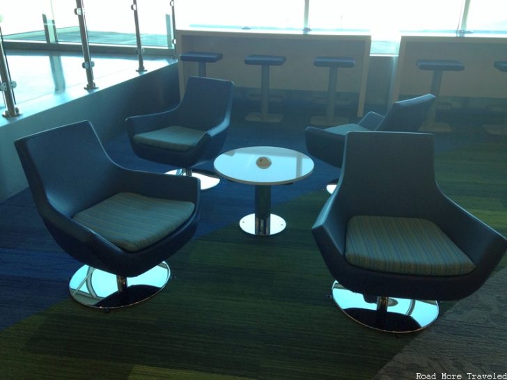 jetBlue gate area - lounge chairs w/ drink table