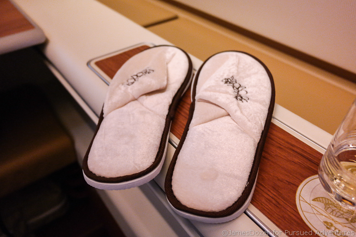 a pair of slippers on a shelf