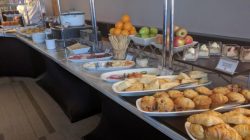 a buffet table with food on it