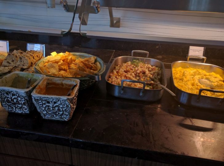 a buffet table with food on it