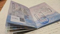 a passport with stamps on it