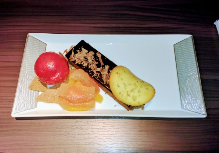 a plate of desserts on a table