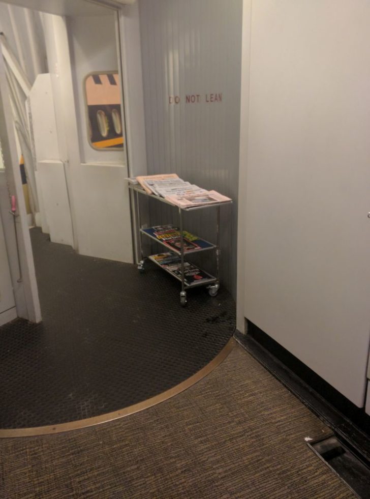 a cart with magazines on it