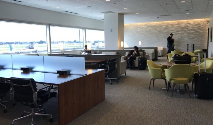 a room with chairs and tables