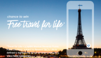 a screen shot of a cell phone with a tower in the background