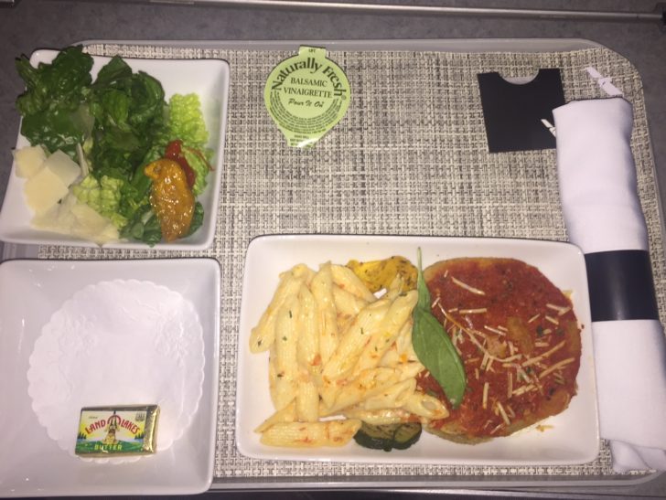 a plate of food on a tray