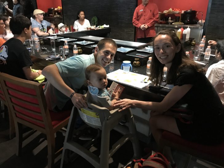 a group of people sitting at a table