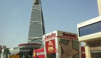 a tall building with a large bell on top