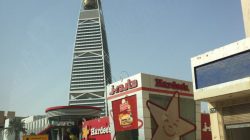 a tall building with a large bell on top
