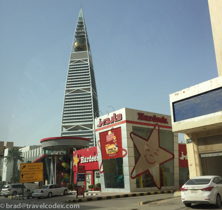 a tall building with a large bell on top