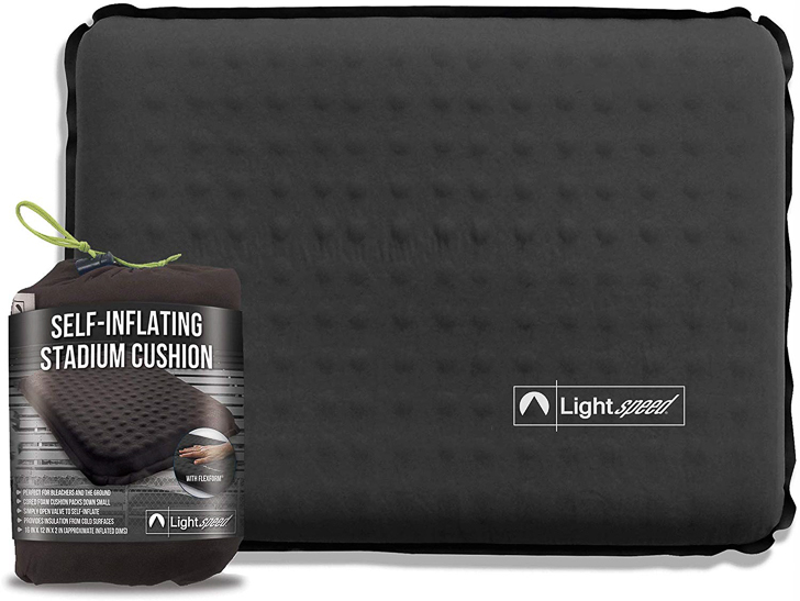 a black cushion with a label on it