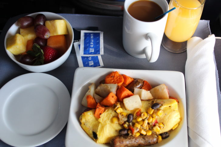 a plate of food and a drink