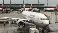 a large white airplane at an airport