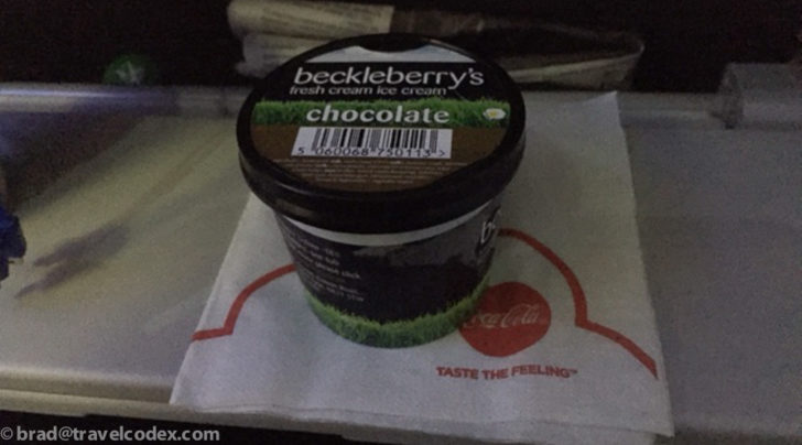 a container of ice cream on a napkin