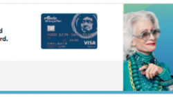 a woman smiling and holding a credit card