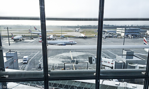 a view of airplanes at an airport