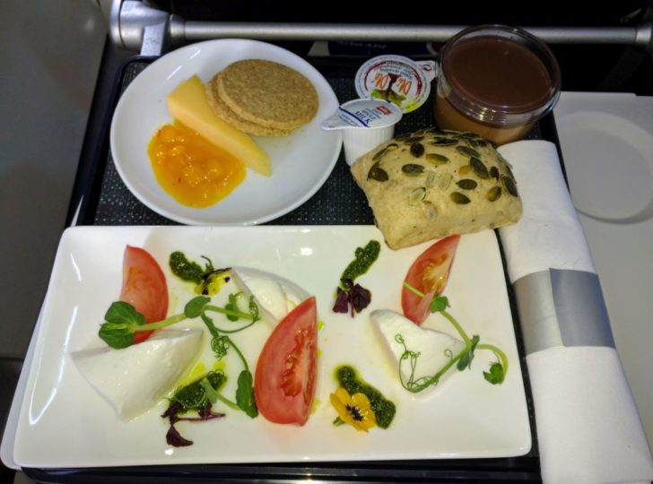 a plate of food on a tray
