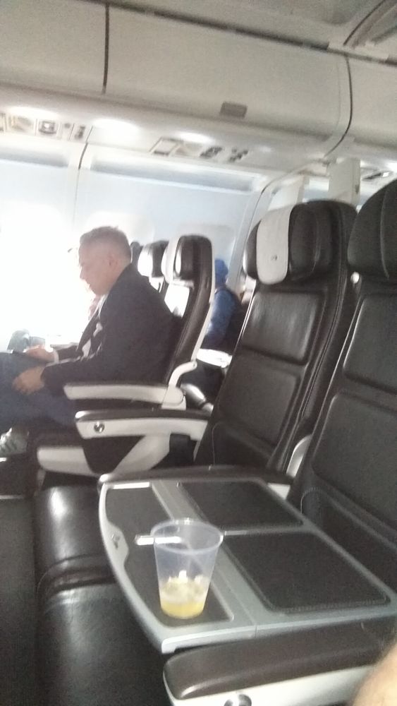 a man sitting in a plane