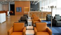 a room with chairs and tables