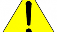 a yellow triangle with a black exclamation mark