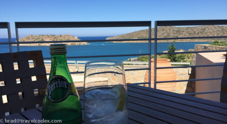 a glass and bottle on a table
