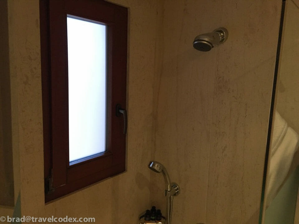 a shower head and a window