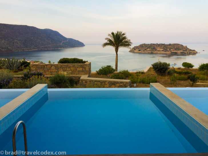 a pool overlooking a body of water