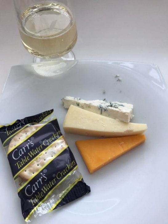 a plate of cheese and crackers
