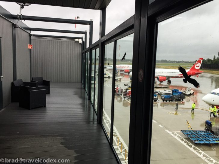 a room with a window and a plane