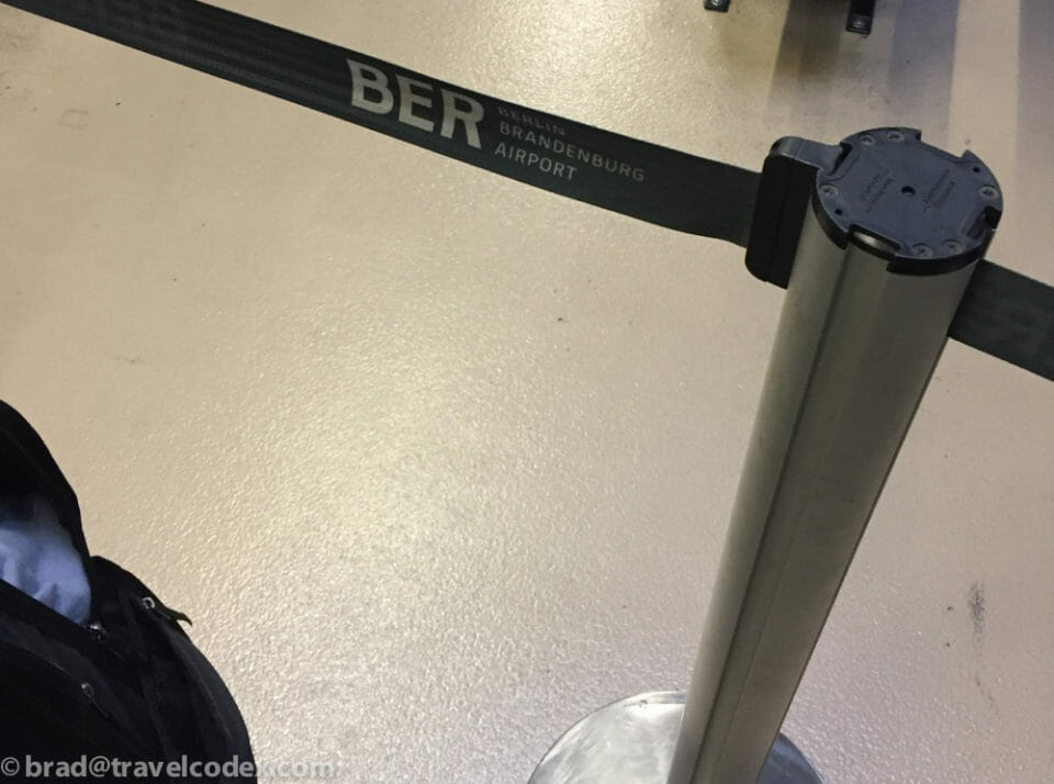 a black and silver pole with a black tape