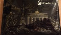 a black plastic bag with a picture of a monument and a statue on it