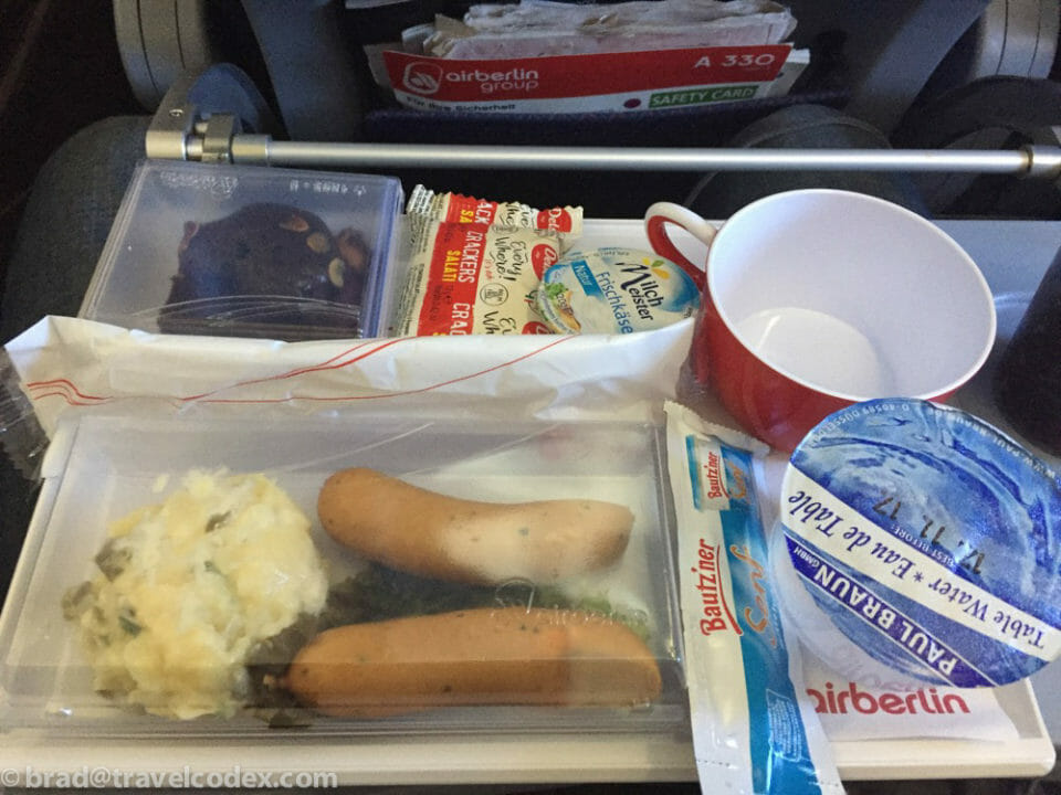 food in a tray on a plane